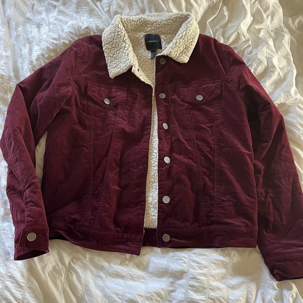 Lightly worn fuzzy lined burgundy jacket size large.